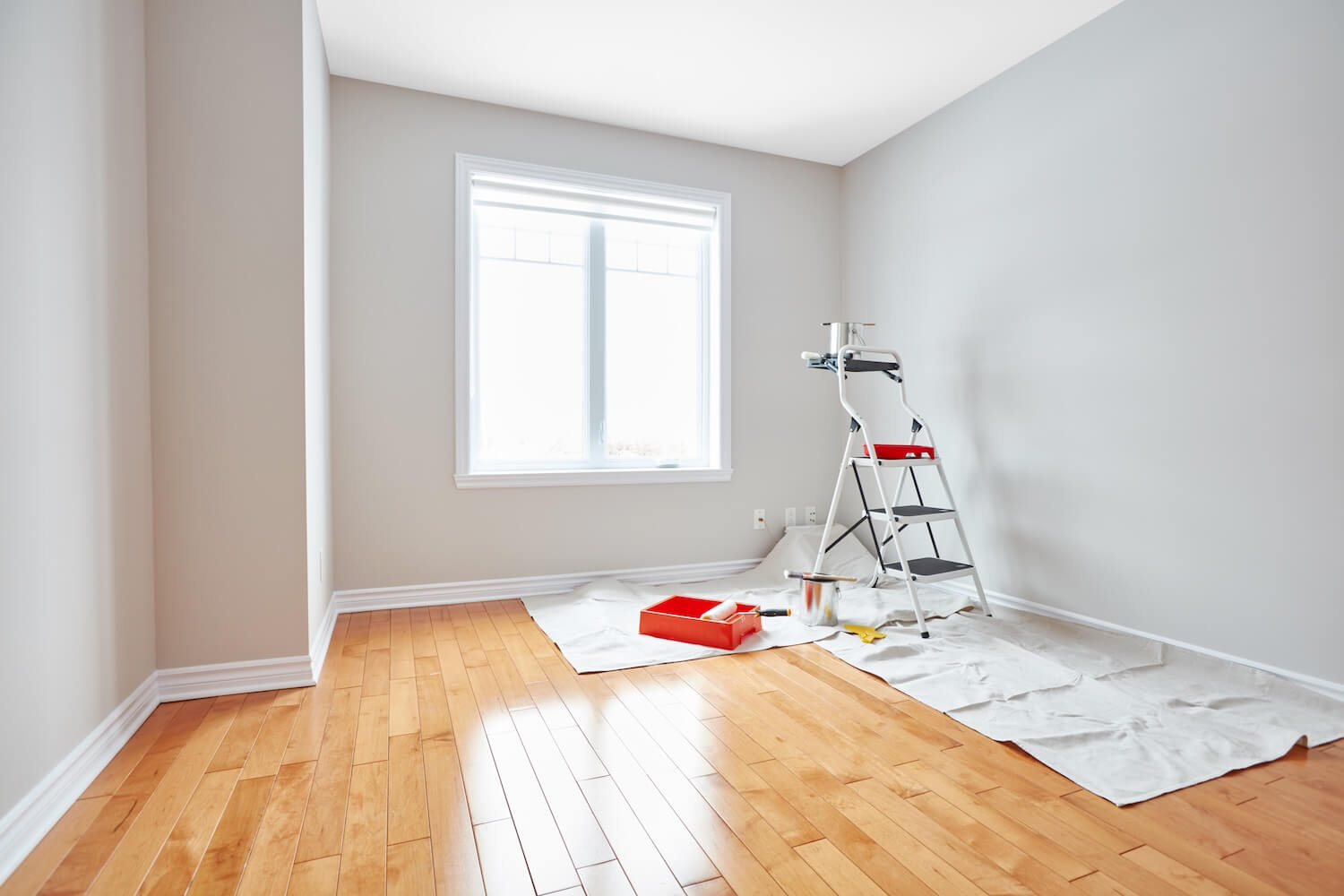 Bates Brothers interior painter working carefully in Pittsford NY home