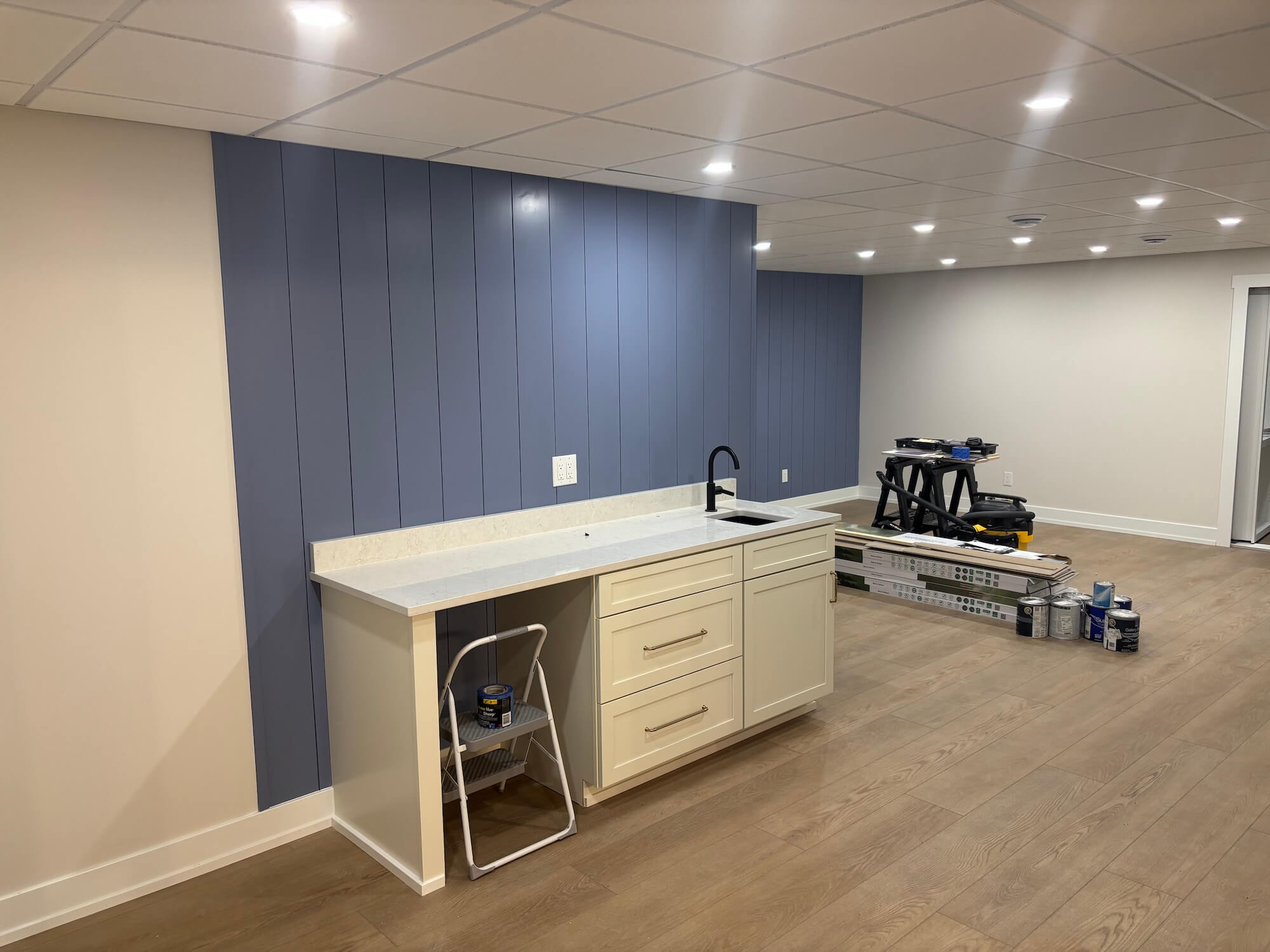professionally painted blue accent wall in rochester home