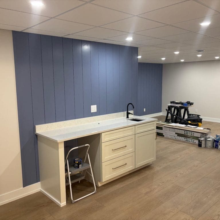 professionally painted blue accent wall in rochester home